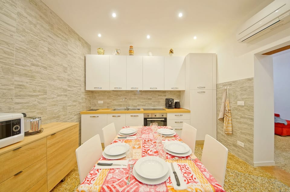 Apartment, 2 Bedrooms, Patio | Private kitchen | Full-size fridge, microwave, oven, stovetop