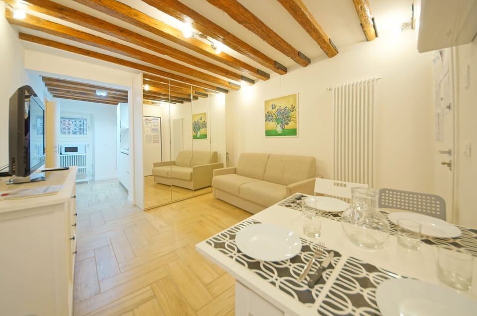 Apartment, 1 Bedroom | Living area | Flat-screen TV