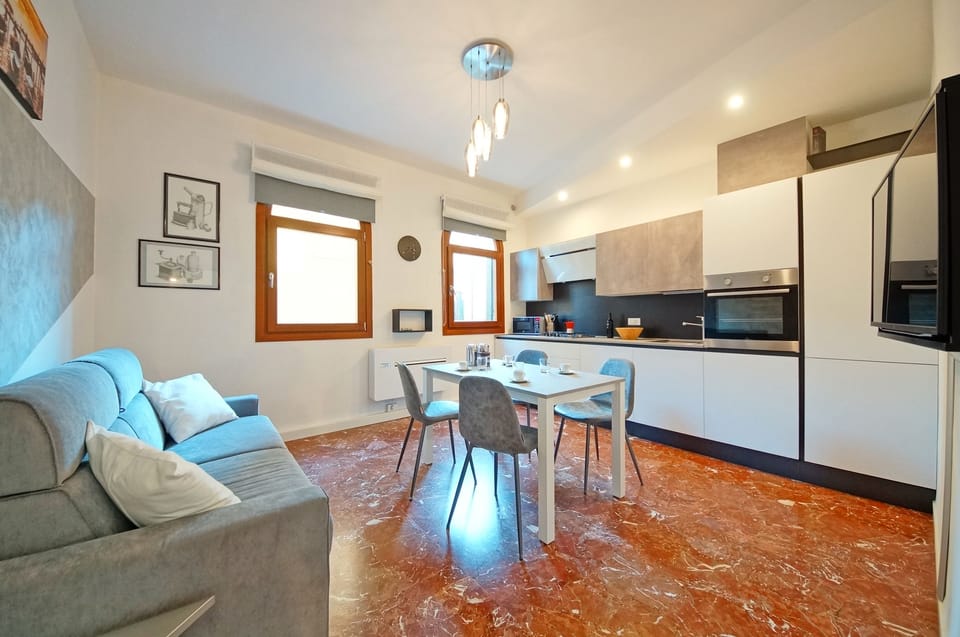 Apartment, 1 Bedroom | Living area | Flat-screen TV
