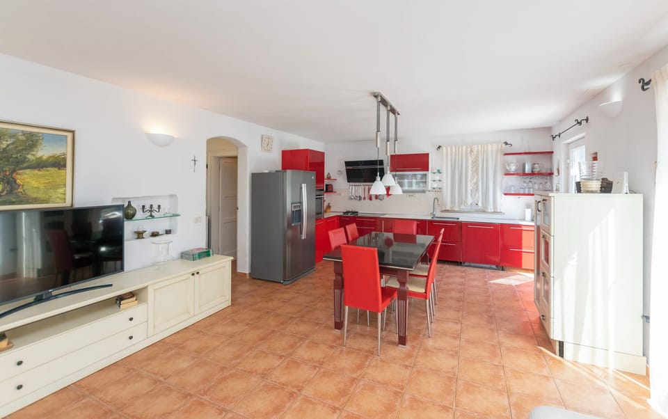 Villa | Private kitchen | Fridge, microwave, oven, stovetop