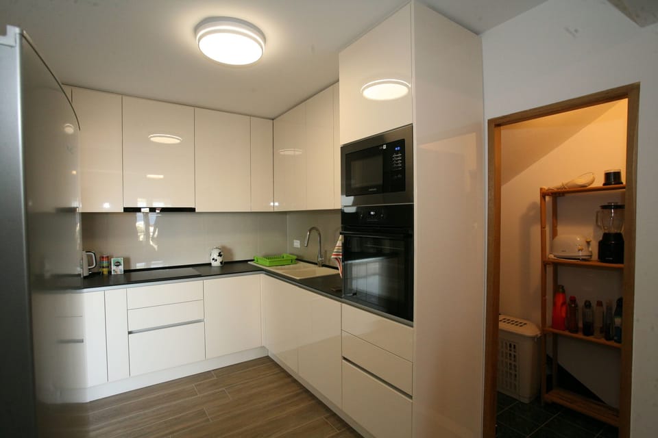 Villa | Private kitchen | Fridge, microwave, oven, stovetop