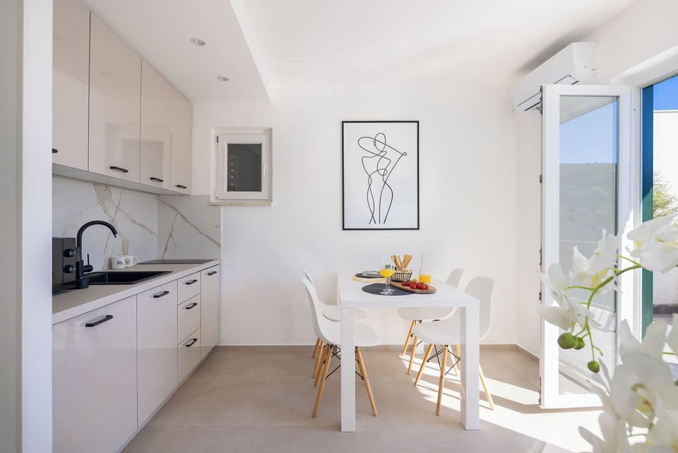 Villa | Private kitchen | Fridge, microwave, oven, stovetop