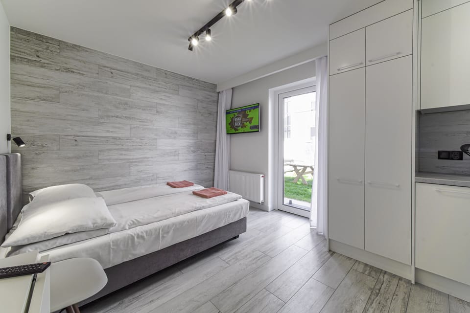 Room (with Garden entrance) | Desk, blackout drapes, WiFi (free), bed sheets