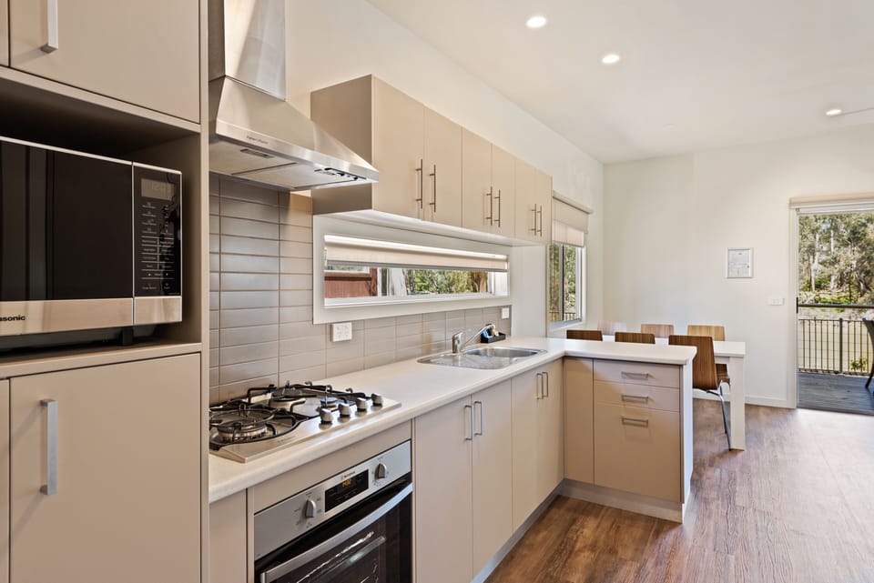 Deluxe 2 Bedroom Riverfront Villa - Sleeps 5 | Private kitchen | Fridge, microwave, stovetop, cookware/dishes/utensils