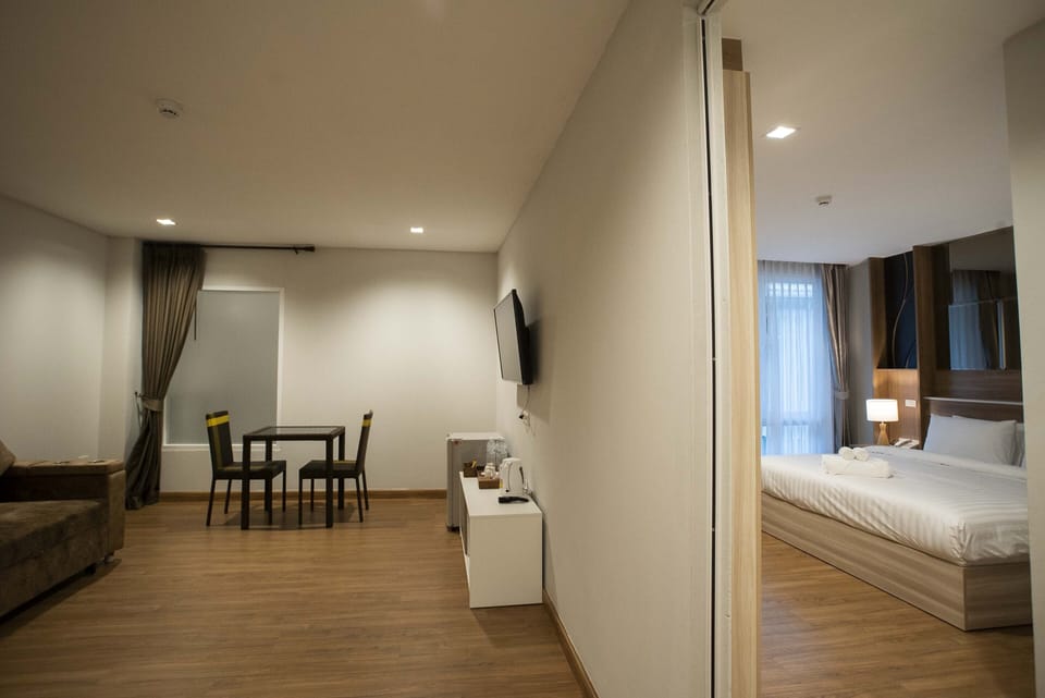 Family Room | 1 bedroom, premium bedding, minibar, in-room safe