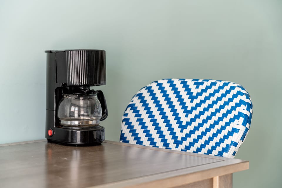 22-inch flat-screen TV with cable channels, TV