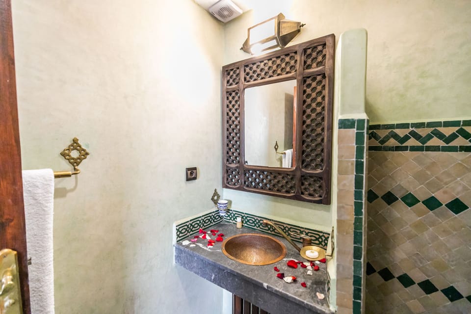 Triple Room | Bathroom | Shower, hair dryer (on request), towels, soap