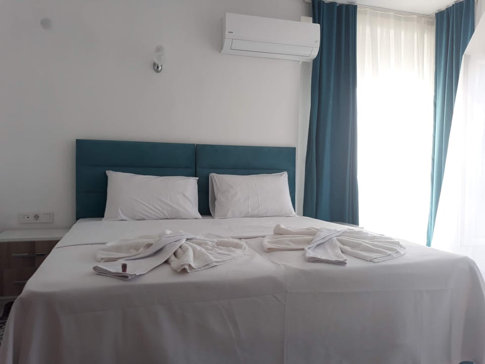Egyptian cotton sheets, premium bedding, down comforters, minibar