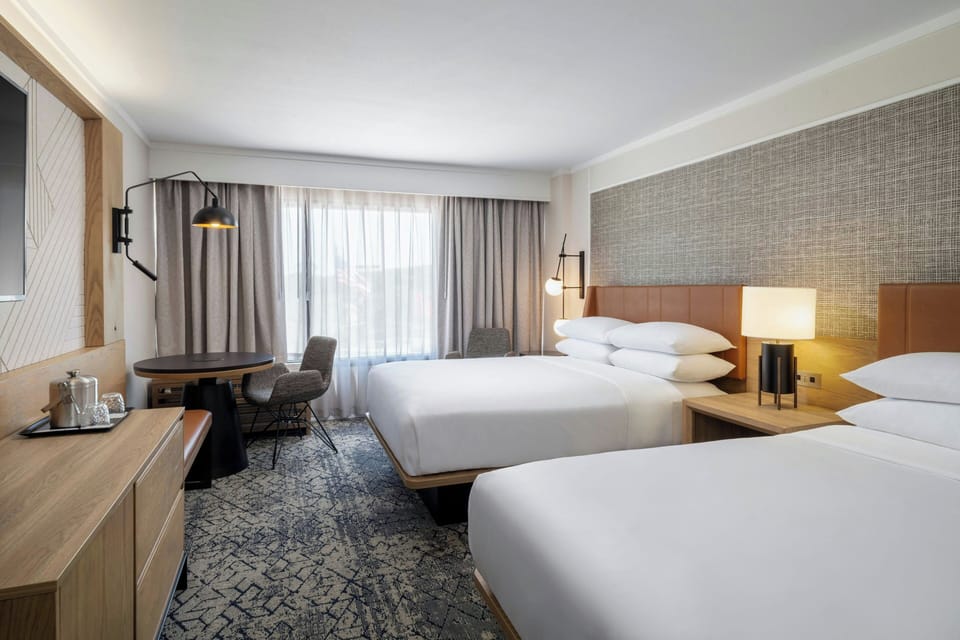 Room, 2 Queen Beds | Premium bedding, in-room safe, desk, blackout drapes