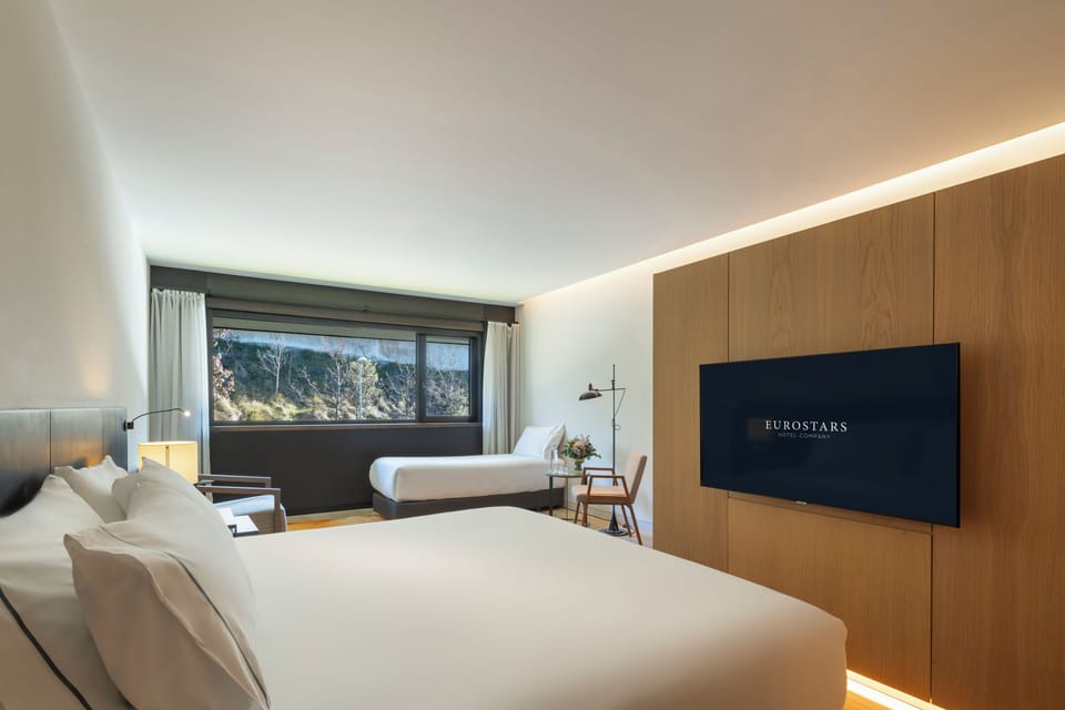 Premium bedding, down comforters, memory foam beds, minibar