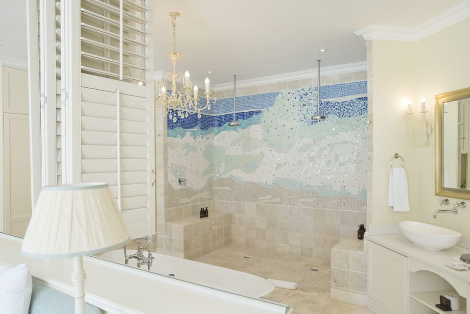 Luxury Suite, 1 King Bed | Bathroom | Separate tub and shower, deep soaking tub, designer toiletries