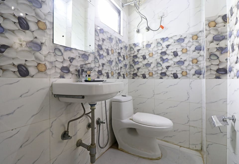 Shower, rainfall showerhead, designer toiletries, hair dryer