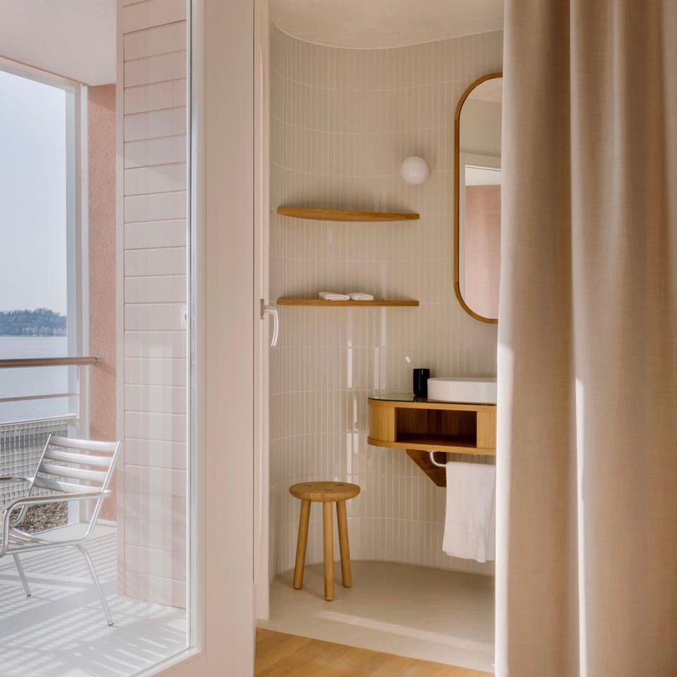 Lake View Design Balcony Room | Bathroom | Designer toiletries, hair dryer, bathrobes, slippers