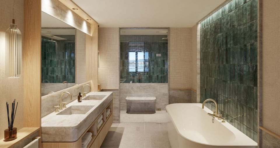 Wellbeing Panorama Suite | Bathroom | Designer toiletries, hair dryer, bathrobes, slippers