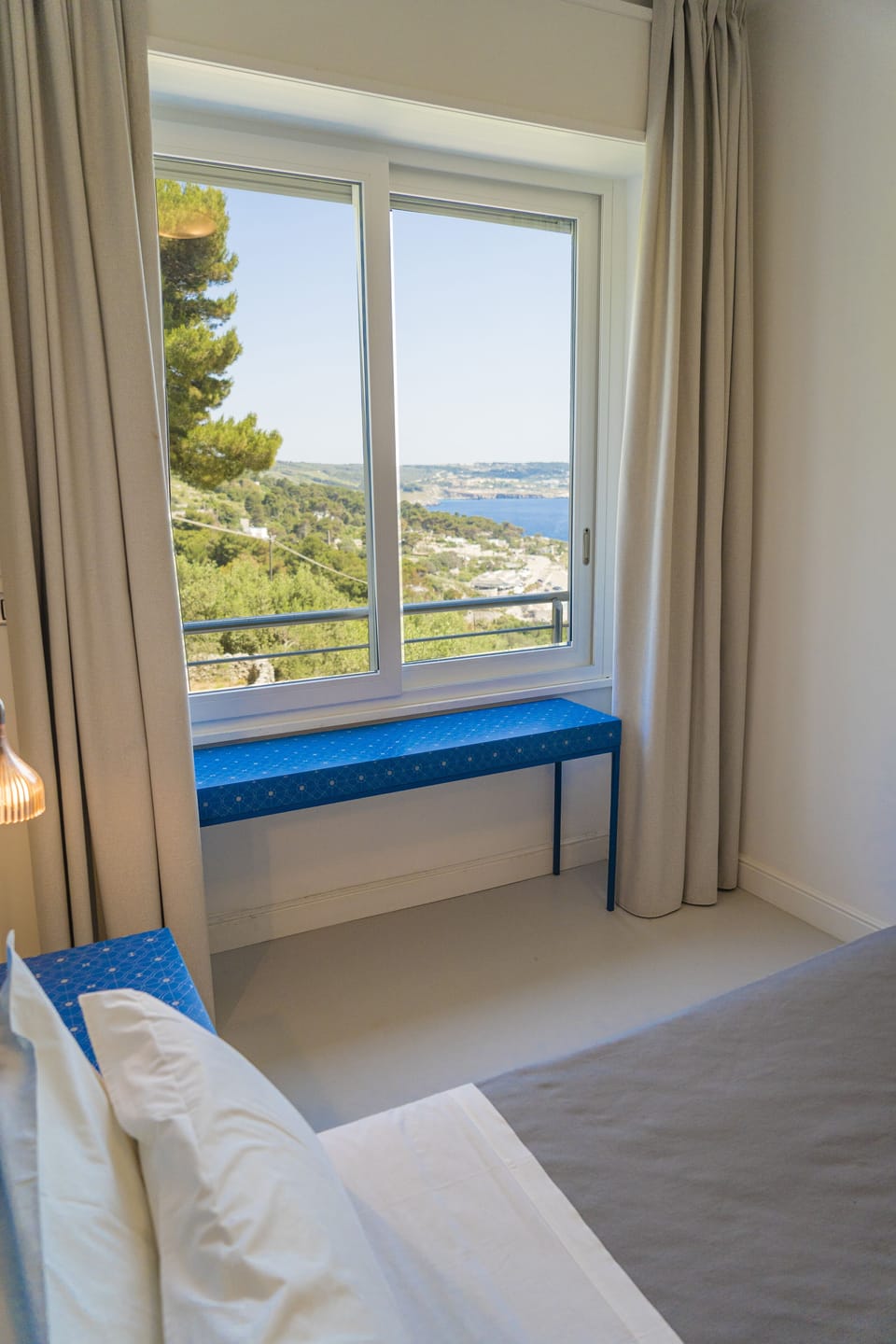 Comfort Double Room, Partial Sea View | Minibar, in-room safe, individually decorated, desk