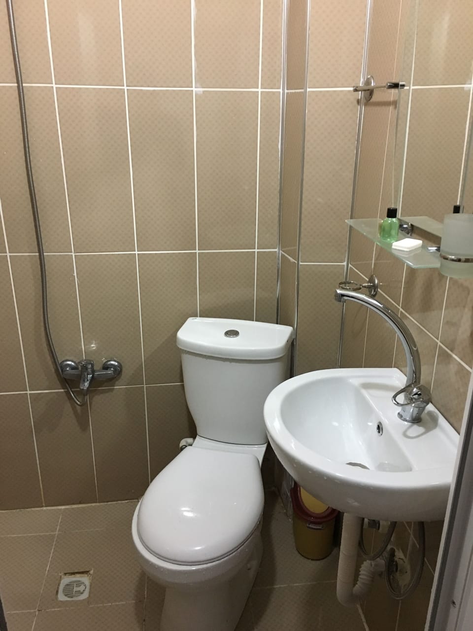 Shower, hydromassage showerhead, hair dryer, towels