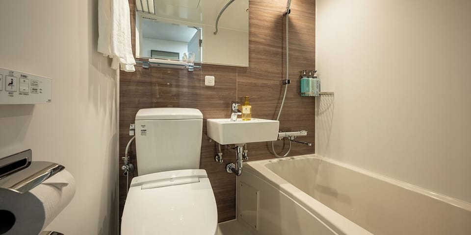 Economy Double, Non-smoking | Bathroom | Combined shower/tub, free toiletries, hair dryer, slippers