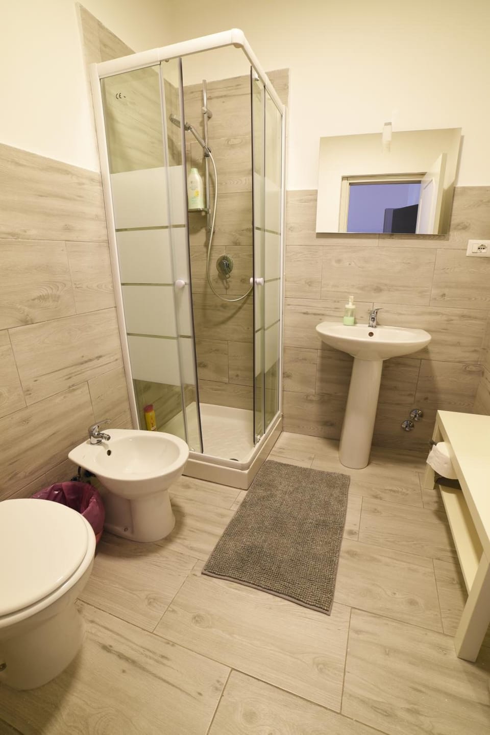 Shower, rainfall showerhead, designer toiletries, hair dryer