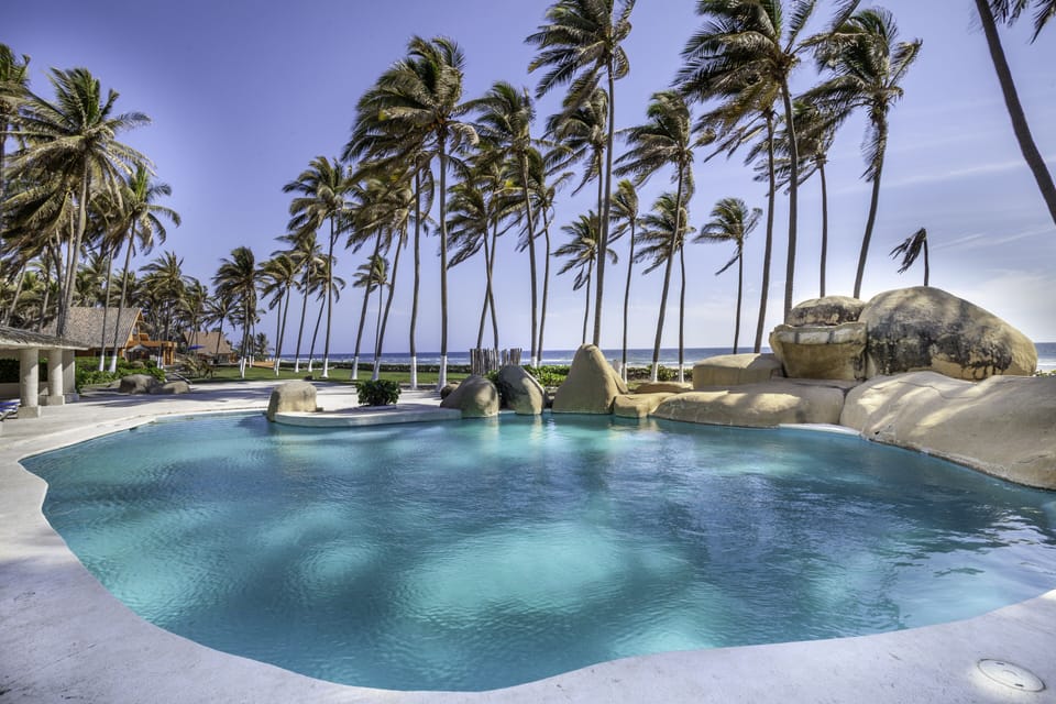 Outdoor pool, open 8:00 AM to 8:00 PM, pool umbrellas, sun loungers