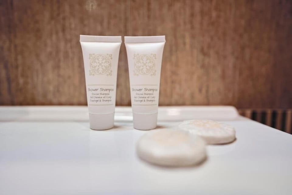 Eco-friendly toiletries, hair dryer, bidet, towels