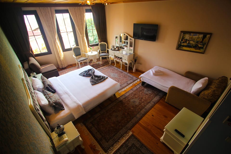 Premium bedding, down comforters, minibar, in-room safe