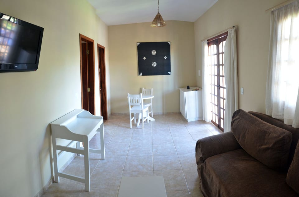 Deluxe Apartment, Pool View | 1 bedroom, in-room safe, desk, laptop workspace