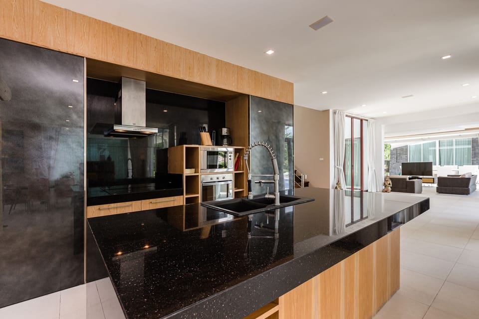 Luxury Villa | Private kitchen | Full-size fridge, microwave, oven, stovetop