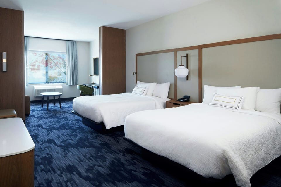Suite, Multiple Beds | 1 bedroom, desk, iron/ironing board, free WiFi