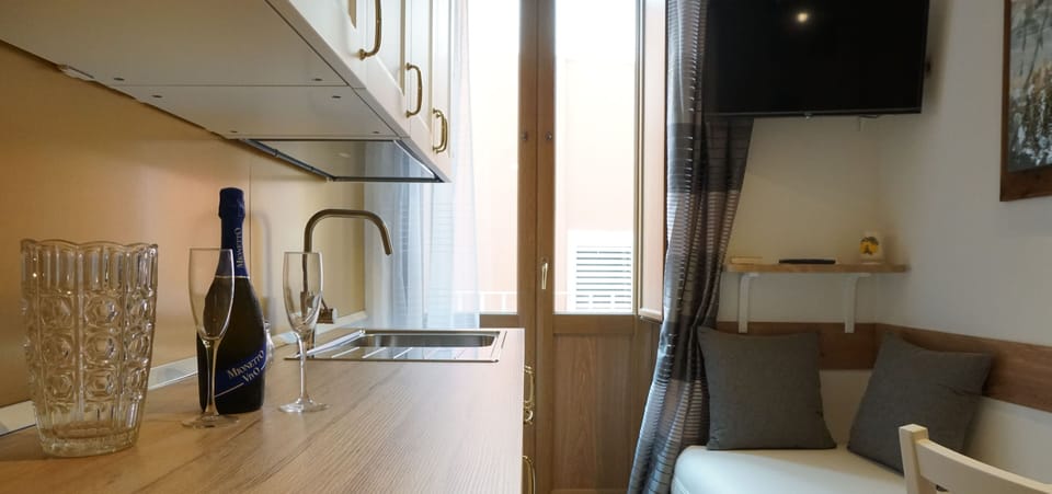 Premium Room | Living area | Flat-screen TV