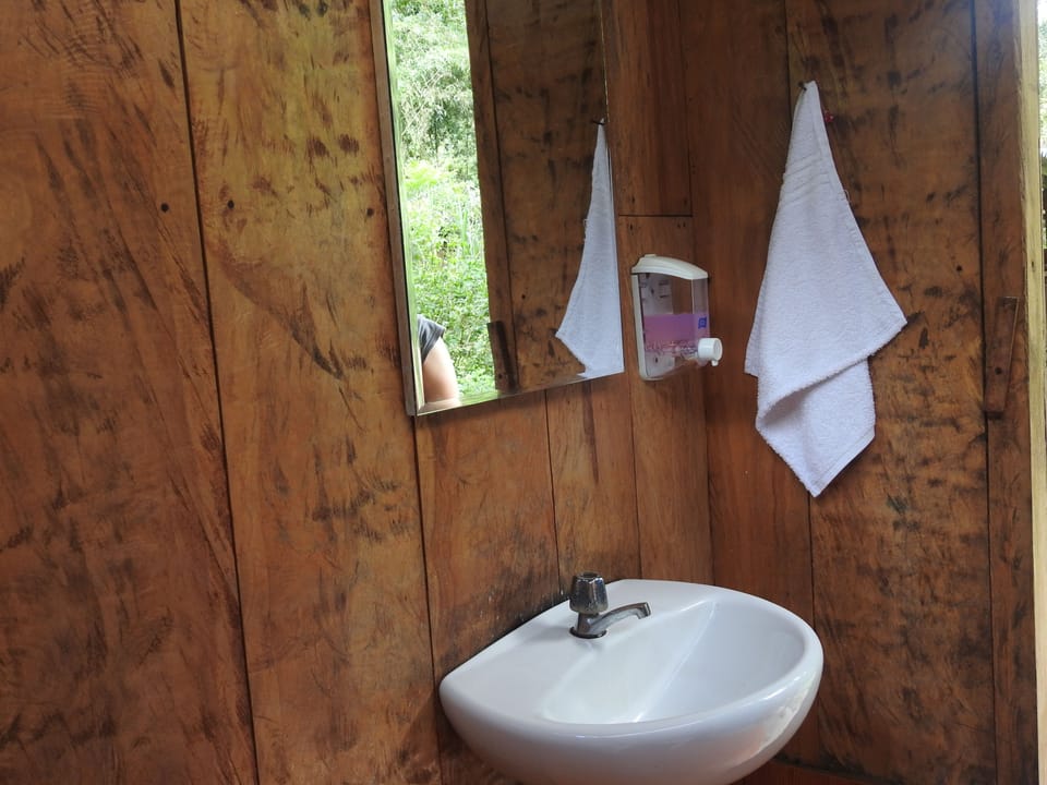 Twin Room, Shared Bathroom | Bathroom | Shower, rainfall showerhead, free toiletries, towels