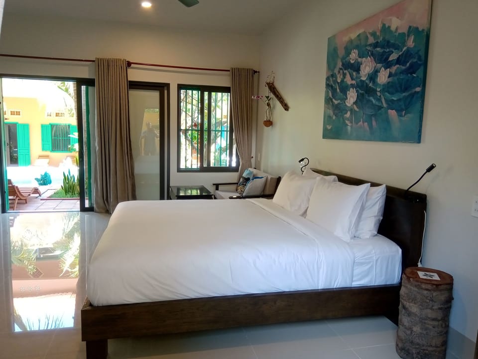 Standard Quadruple Room (North Wind) | Minibar, in-room safe, individually decorated, individually furnished