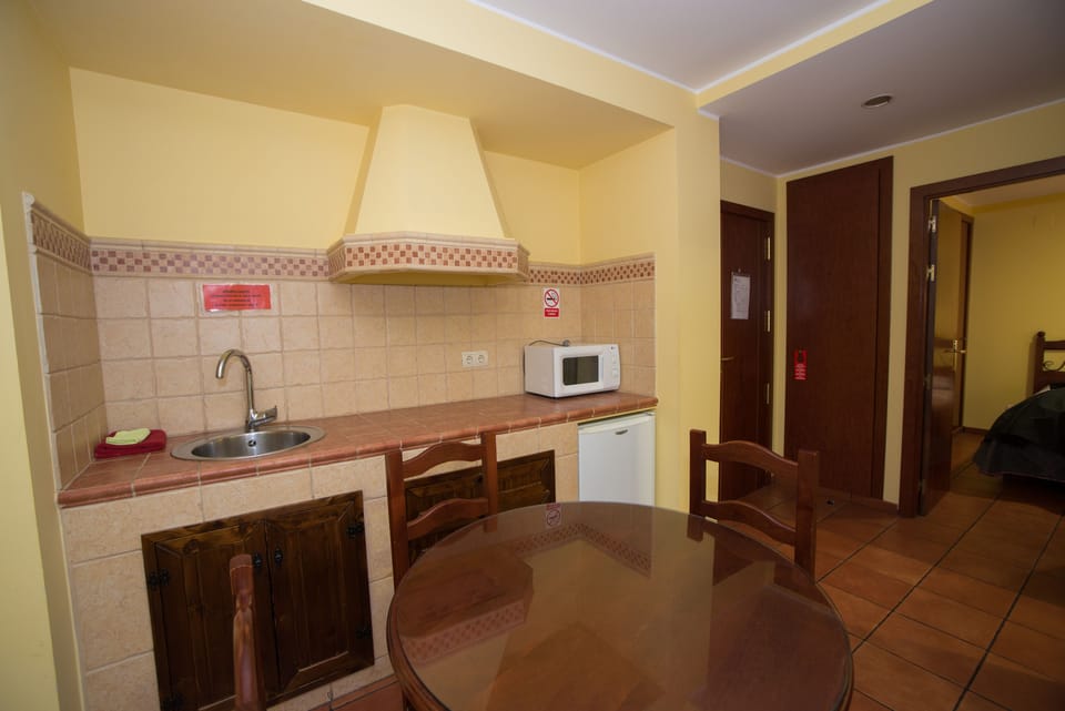 Family Double Room | Living area | Flat-screen TV
