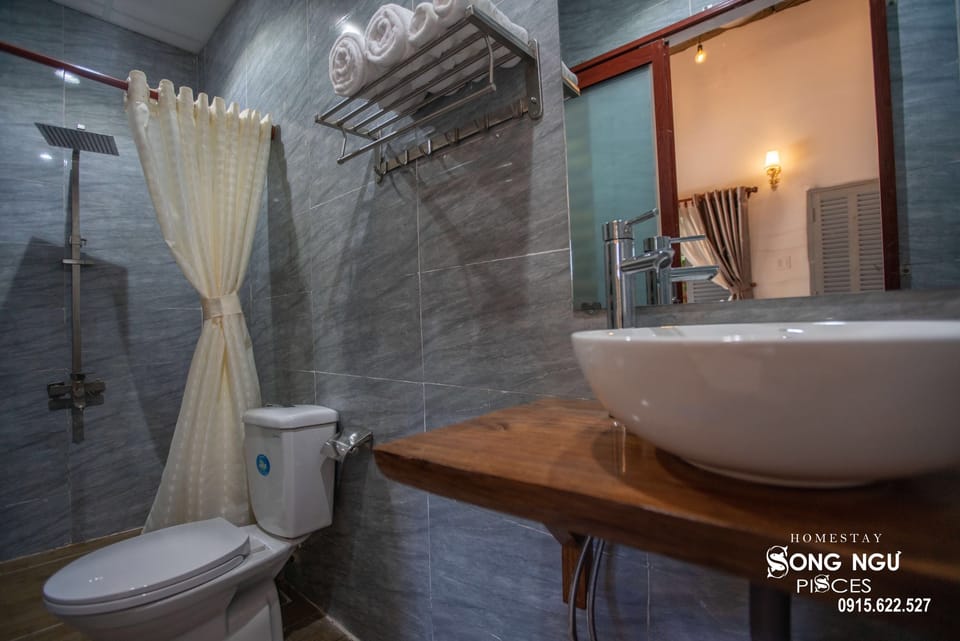 Shower, free toiletries, hair dryer, slippers
