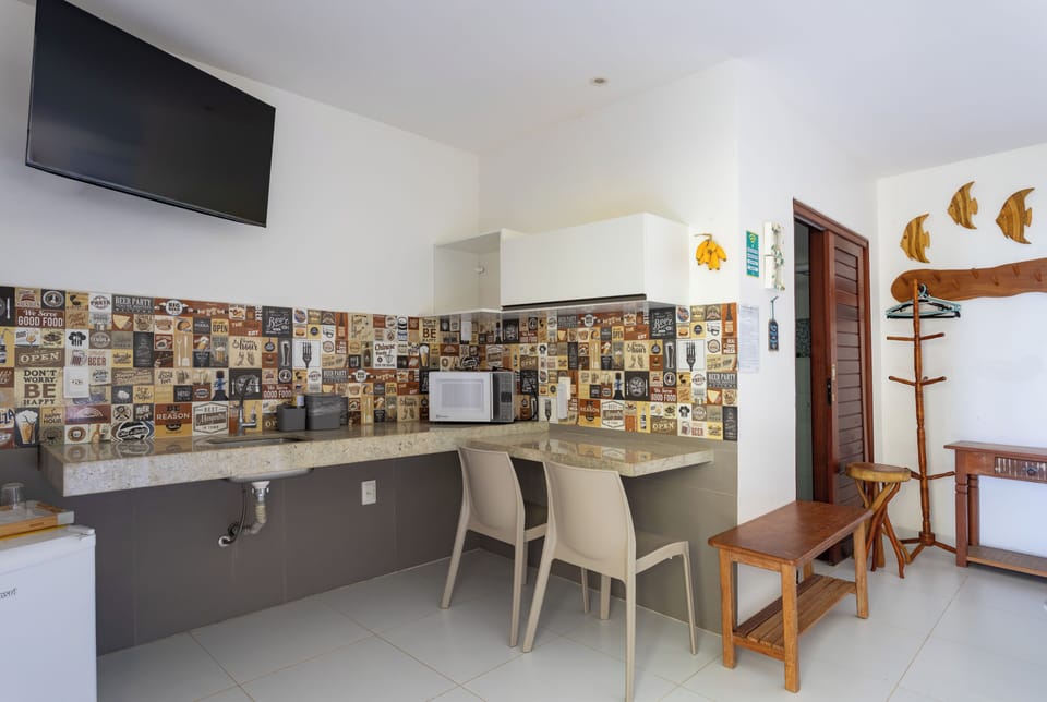 Family Quadruple Room, 1 Bedroom, Beach View | Private kitchen | Fridge, microwave, stovetop, cookware/dishes/utensils