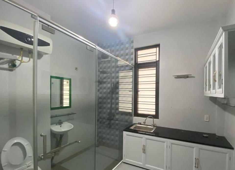 Shower, slippers, towels, soap