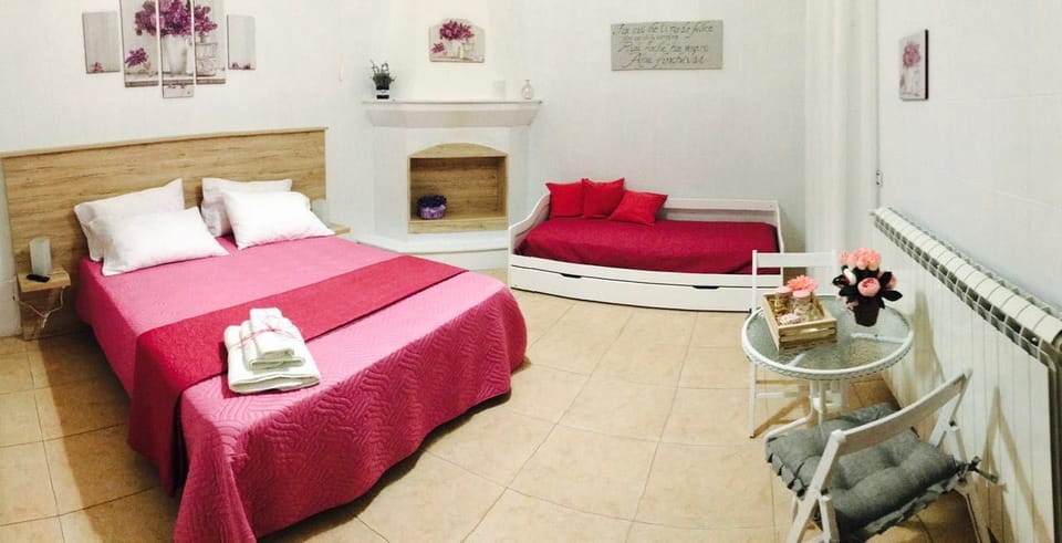 Basic Quadruple Room, Shared Bathroom | Iron/ironing board, cribs/infant beds, free WiFi, bed sheets