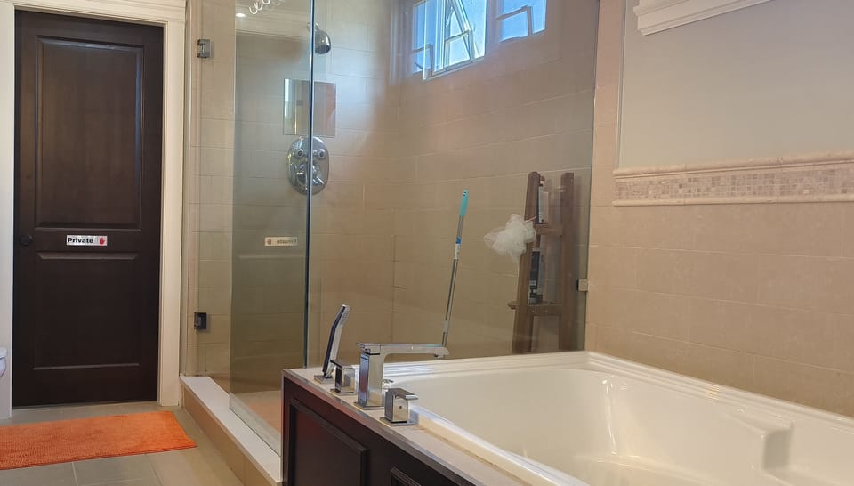 Luxury Studio Suite | Bathroom | Combined shower/tub, deep soaking tub, hydromassage showerhead
