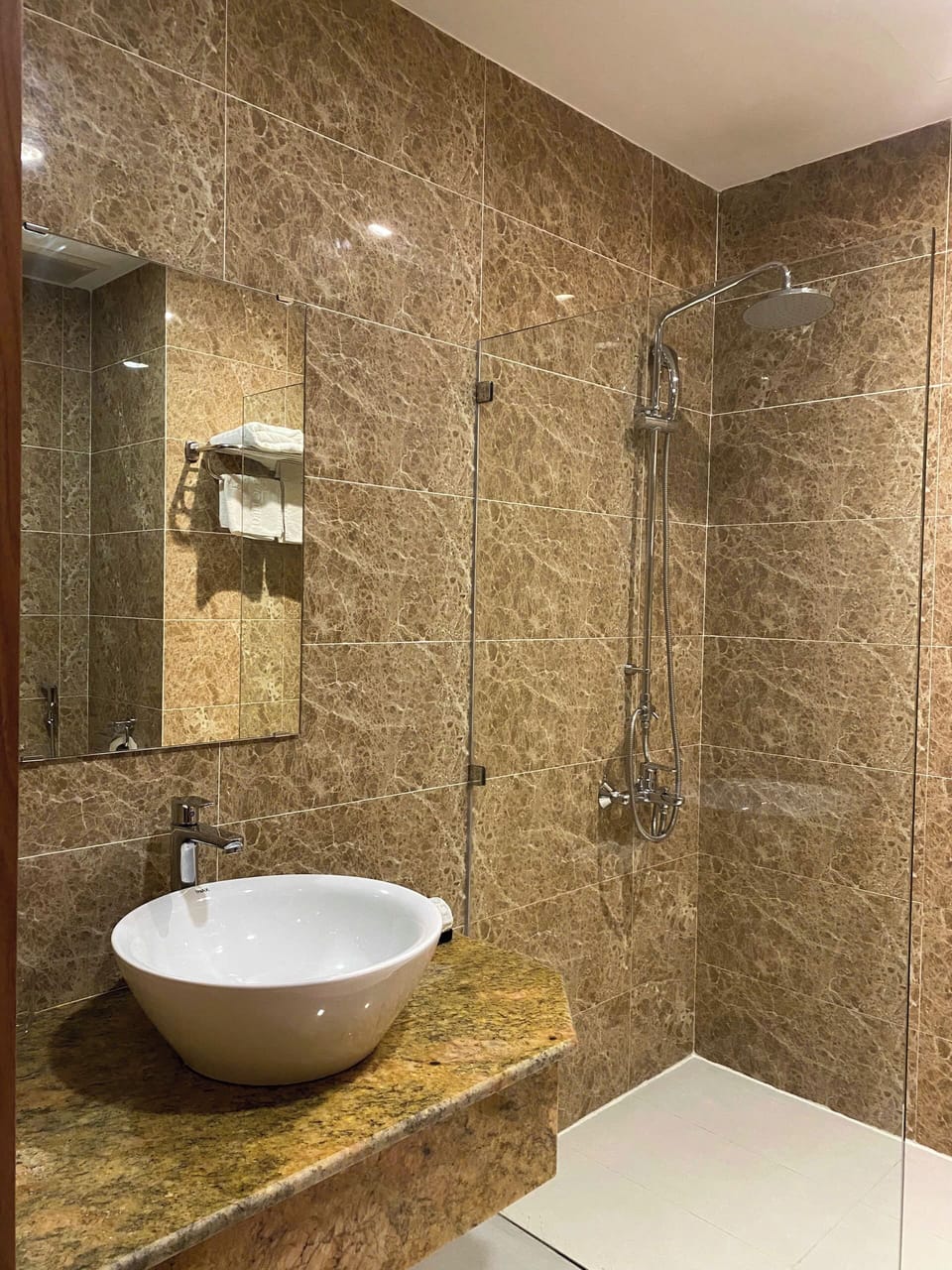 Shower, free toiletries, hair dryer, slippers