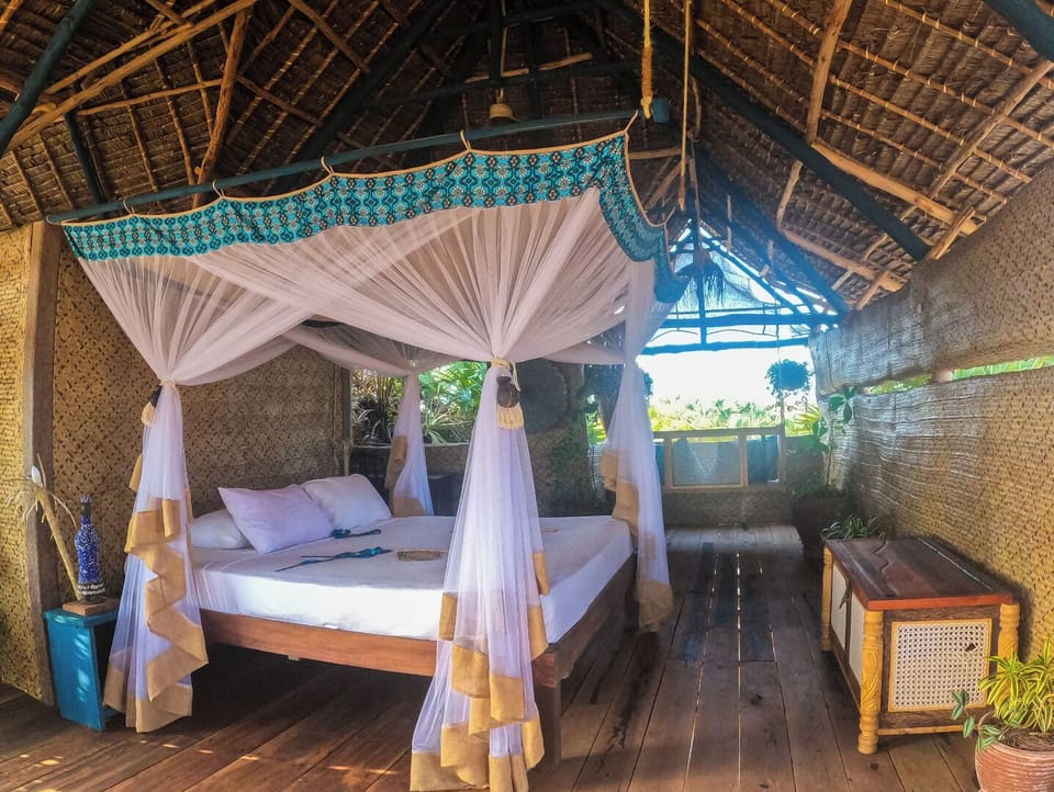 Deluxe Bungalow, Beach View, Beachfront | In-room safe, desk, soundproofing, free WiFi