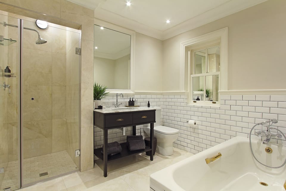 Luxury Suite, 1 Bedroom | Bathroom | Designer toiletries, hair dryer, bathrobes, towels