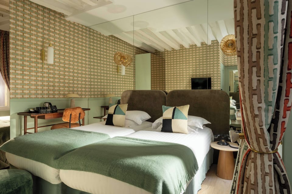 Superior Twin Room | Minibar, in-room safe, individually decorated, individually furnished