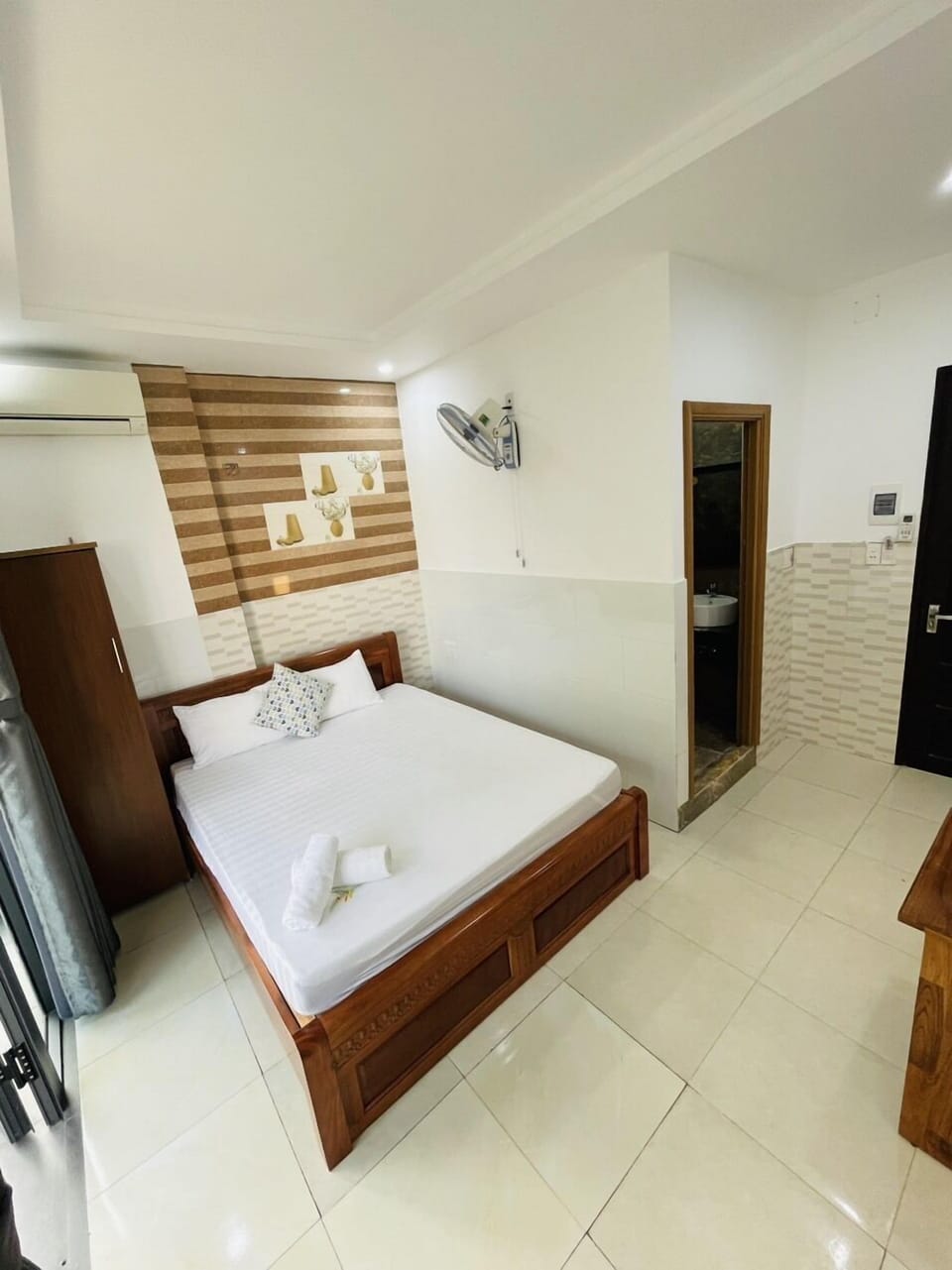 Deluxe Room, Balcony | Minibar, desk, laptop workspace, iron/ironing board