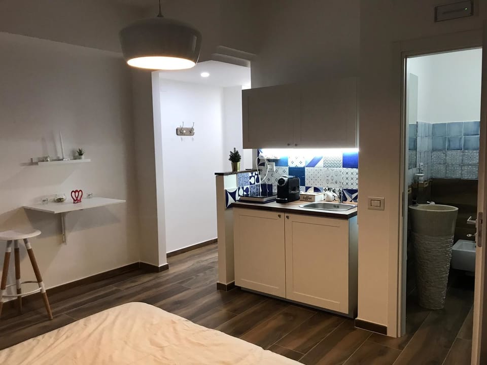 Deluxe Double Room | Private kitchenette | Espresso maker, coffee/tea maker, electric kettle