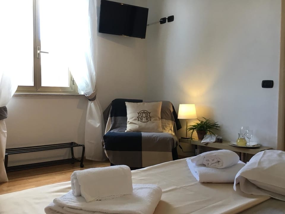 Deluxe Double or Twin Room, Private Bathroom (external) | In-room safe, desk, cribs/infant beds, rollaway beds