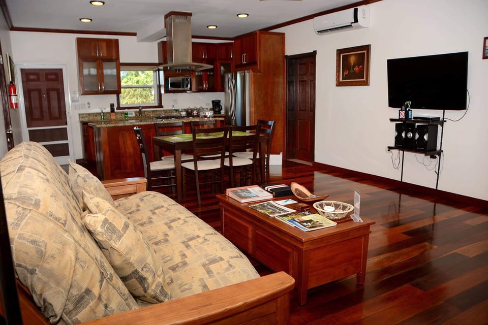 Deluxe Suite, 1 Bedroom (Namaste) | Living area | 40-inch Smart TV with cable channels, TV, DVD player