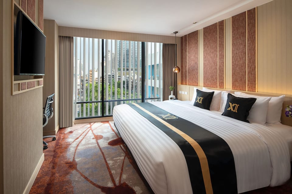 Grand Deluxe Super King Room | Premium bedding, in-room safe, desk, laptop workspace