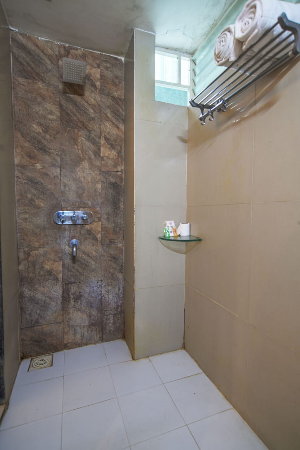 Family Room | Bathroom | Shower, rainfall showerhead, slippers, towels