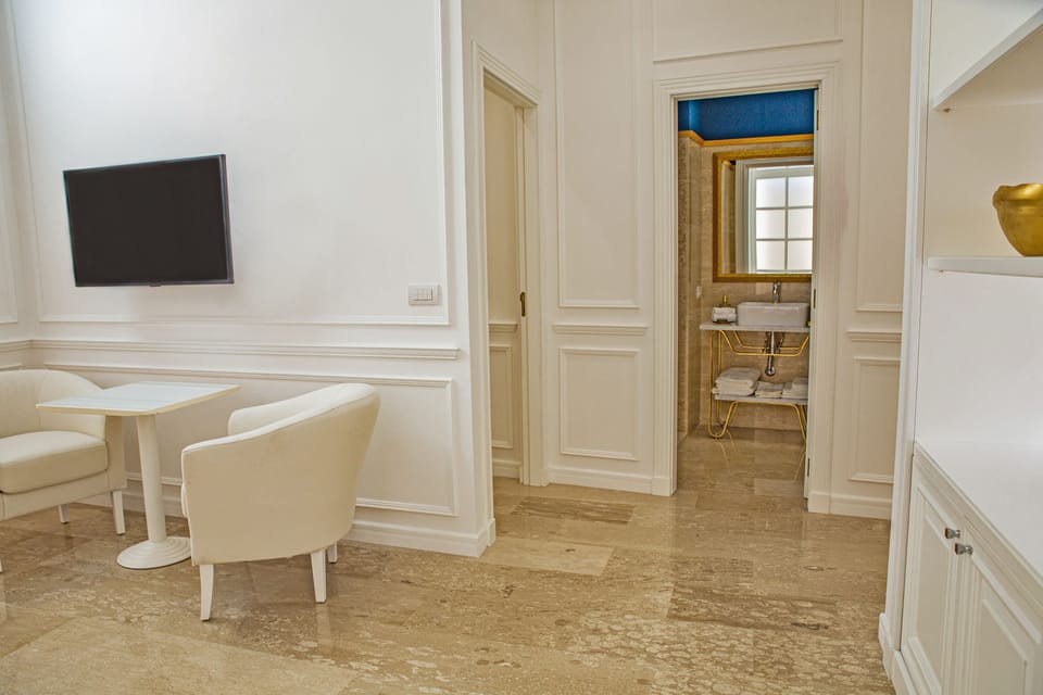 Junior Suite | Living room | Flat-screen TV