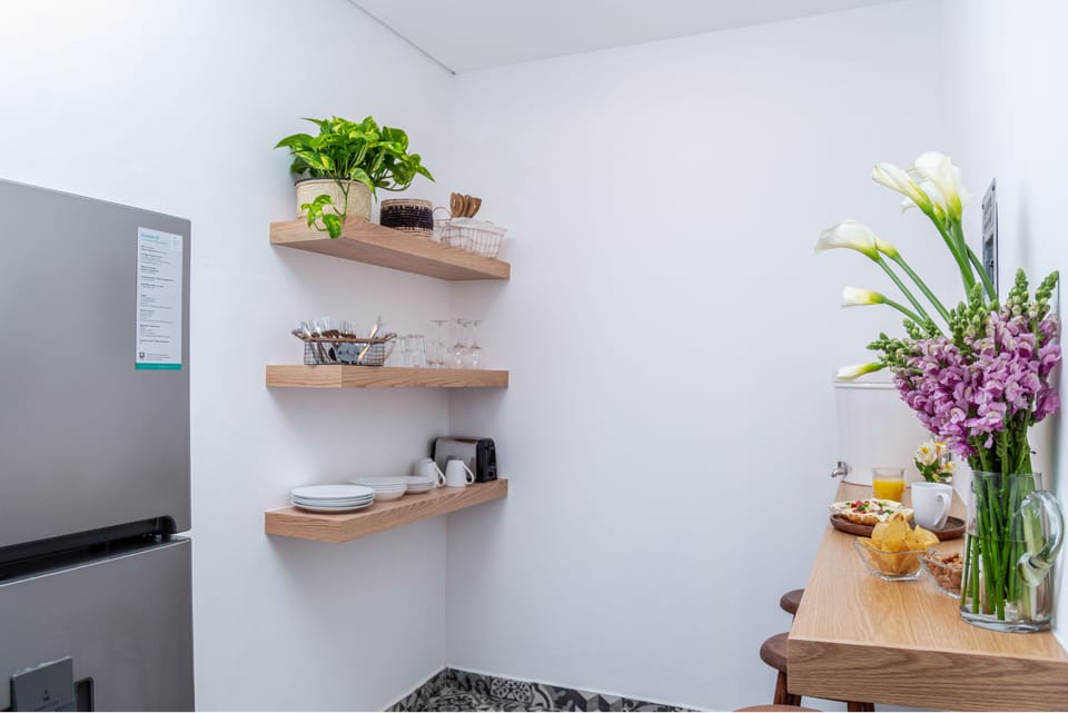 Signature Apartment | Private kitchen | Full-size fridge, microwave, oven, stovetop