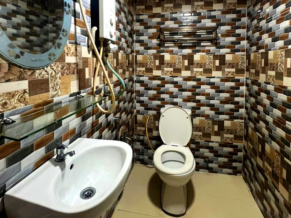 Shower, slippers, towels, soap
